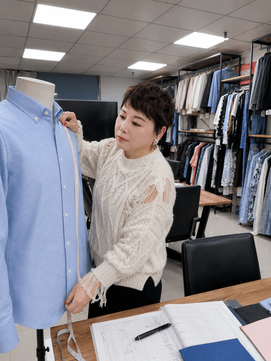 Sample measurement and fit review on a smart-casual shirt